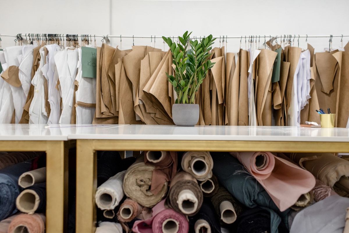 Rolls of natural textile fabric in a workshop